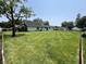 Green backyard with lush lawn, providing ample space and privacy for outdoor enjoyment at 1175 Central Ave, Noblesville, IN 46060