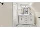 Double vanity bathroom with white cabinets and marble counters at 1175 Central Ave, Noblesville, IN 46060