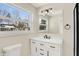 Modern bathroom with a white vanity and black matte fixtures at 1175 Central Ave, Noblesville, IN 46060