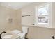 Updated bathroom with tub, shower, and granite vanity at 1175 Central Ave, Noblesville, IN 46060