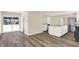 Open concept dining area with view into the kitchen at 1175 Central Ave, Noblesville, IN 46060