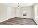 Dining room with hardwood floors, light walls, and open concept at 1175 Central Ave, Noblesville, IN 46060