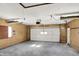 Spacious garage with overhead door and ample storage at 1175 Central Ave, Noblesville, IN 46060