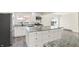 Modern kitchen with granite island and stainless steel appliances at 1175 Central Ave, Noblesville, IN 46060