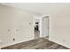 Laundry room with view into kitchen and hardwood floors at 1175 Central Ave, Noblesville, IN 46060