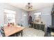 Cozy dining area with a wooden table and black metal chairs at 1310 Twilight Dr, Noblesville, IN 46060