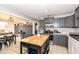 Gray kitchen with an island and stainless steel appliances at 1310 Twilight Dr, Noblesville, IN 46060