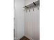 Hall tree featuring a shelf and black metal hooks set against white vertical shiplap at 1674 Solebar Way, Westfield, IN 46074
