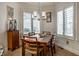 Charming breakfast nook with a wooden table and built-in cabinetry at 1677 Ashwood Dr, Greenwood, IN 46143