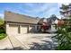 Three-car garage and large driveway at 1677 Ashwood Dr, Greenwood, IN 46143