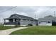 Charming single Gathering home with an inviting front porch and detached garage, perfect for storage and hobbies at 18 S Franklin St, Greenfield, IN 46140