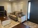 Comfortable living area with neutral-toned furniture, stylish decor, and ample natural light at 18 S Franklin St, Greenfield, IN 46140
