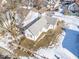 High-angle view of a white house with a small yard and surrounding houses at 1913 S Talbott Se St, Indianapolis, IN 46225