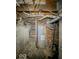 Unfinished basement with water heater and exposed pipes at 1913 S Talbott Se St, Indianapolis, IN 46225
