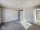 Simple bedroom with carpet and window at 1913 S Talbott Se St, Indianapolis, IN 46225
