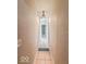 Clean hallway with light walls and tile flooring at 1913 S Talbott Se St, Indianapolis, IN 46225