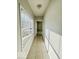 Bright hallway with tile flooring and window at 1913 S Talbott Se St, Indianapolis, IN 46225