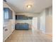 Newly renovated kitchen featuring gray cabinets and tile flooring at 1913 S Talbott Se St, Indianapolis, IN 46225