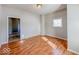 Bright living room with hardwood floors and neutral walls at 1913 S Talbott Se St, Indianapolis, IN 46225