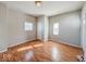 Spacious living room featuring hardwood floors and ample natural light at 1913 S Talbott Se St, Indianapolis, IN 46225