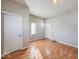 Living room with hardwood floors and access to exterior at 1913 S Talbott Se St, Indianapolis, IN 46225