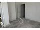 Empty bedroom with hardwood floors and white walls at 2033 Carrollton Ave, Indianapolis, IN 46202