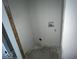Unfinished laundry room with plumbing and electrical at 2033 Carrollton Ave, Indianapolis, IN 46202