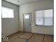 Bright living room with new door and vinyl flooring at 2033 Carrollton Ave, Indianapolis, IN 46202