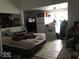 Main bedroom with a bed, kitchenette, and additional storage at 2165 S Meridian S St, Indianapolis, IN 46225