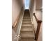 Carpeted stairs leading to the lower level at 2208 Walnut Frk Dr, Whitestown, IN 46075