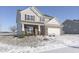 Two-story house with brick and siding, white garage door, and landscaped yard at 2248 Sante Fe Dr, Greenfield, IN 46140