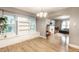 Spacious dining room with abundant natural light and hardwood floors at 361 S Spencer Ave, Indianapolis, IN 46219