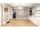 Open dining room with hardwood floors, and stylish light fixtures at 361 S Spencer Ave, Indianapolis, IN 46219