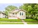 Charming single-story home featuring a cozy front porch and well-maintained lawn at 361 S Spencer Ave, Indianapolis, IN 46219