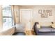 Cozy living room featuring a comfortable sofa and plenty of natural light at 361 S Spencer Ave, Indianapolis, IN 46219