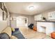 Bright living room features a decorative fireplace and stylish furnishings at 361 S Spencer Ave, Indianapolis, IN 46219