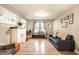 Bright living room features a decorative fireplace and stylish furnishings at 361 S Spencer Ave, Indianapolis, IN 46219