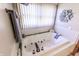 Relaxing bathroom with a large jetted tub at 3819 S Village Dr, New Palestine, IN 46163