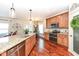 Modern kitchen with stainless steel appliances and granite countertops at 502 Elnora Ln, Westfield, IN 46074