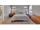 Comfortable bedroom with a queen-size bed and en-suite bathroom at 5246 Parkhurst Xing, McCordsville, IN 46055