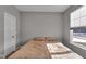 Simple bedroom with a double bed and a large window at 5246 Parkhurst Xing, McCordsville, IN 46055