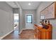 Bright entryway with wood-look floors, leading to other rooms at 5246 Parkhurst Xing, McCordsville, IN 46055