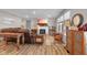 Living room with fireplace, sectional sofa and hardwood floors at 5246 Parkhurst Xing, McCordsville, IN 46055