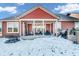 Cozy covered patio with seating and built-in grill at 5246 Parkhurst Xing, McCordsville, IN 46055