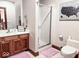 Clean bathroom with double vanity and a glass shower at 5465 S State Road 75, Jamestown, IN 46147