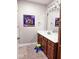 Clean bathroom with wood vanity and updated fixtures at 5465 S State Road 75, Jamestown, IN 46147