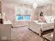 Charming bedroom with white furniture and plush carpet at 5465 S State Road 75, Jamestown, IN 46147