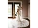 Bride in a gorgeous lace wedding dress at 5465 S State Road 75, Jamestown, IN 46147