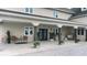 Inviting barn-style exterior with a large covered porch and landscaping at 5465 S State Road 75, Jamestown, IN 46147