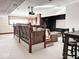 Basement home theater with tiered seating and projector at 5465 S State Road 75, Jamestown, IN 46147